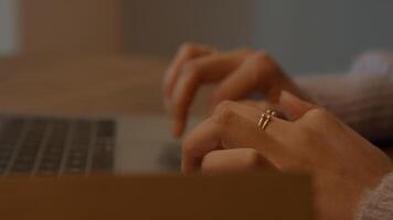 Hands of woman scrolling on touch pad photo