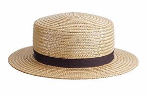 sombrero de paja sobre un fondo blanco foto