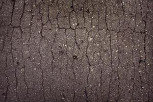 asfalto con numerosas pequeñas grietas foto