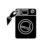 Self-service laundry black glyph icon vector