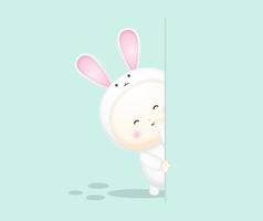 Cute baby in bunny costume behind a wall. vector