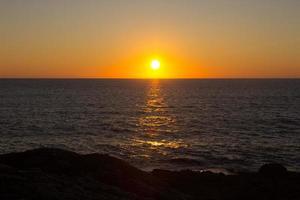 Sunset over the sea photo