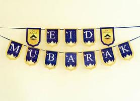 Eidmubarak label hanging on wall photo