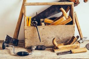 Old Wooden Tool Box Full of Tools. Old carpentry tools. Still life photo
