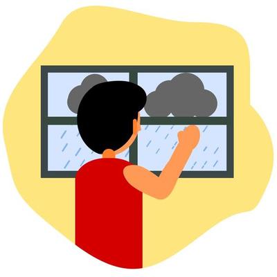 Boy looking out of window on a rainy day concept