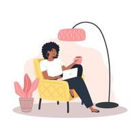 Young woman sitting on armchair and working on laptop from home vector