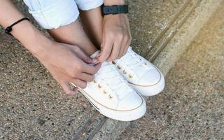 White casual shoes making decision photo