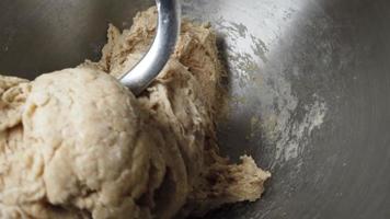 Dough kneading machine is kneading dough for making bread video