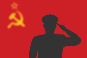 Solder silhouette on blur background with Soviet Union flag. vector