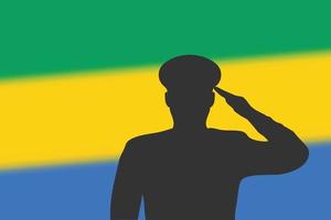 Solder silhouette on blur background with Gabon flag. vector