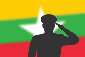 silueta de soldadura sobre fondo borroso con la bandera de myanmar. vector