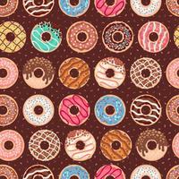 Seamless pattern with colorful donuts with glaze vector