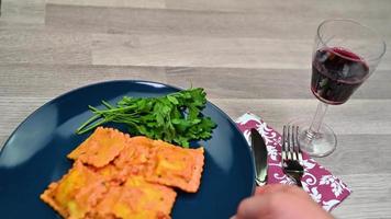 serve a plate of ravioli at the table video