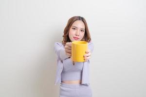 portrait beautiful Asian woman holding coffee cup or mug photo