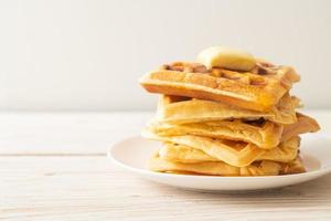 waffle stack with butter and honey photo