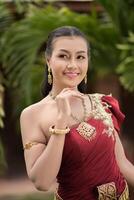 Beautiful Woman wearing typical Thai dress photo