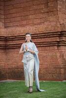 Beautiful Woman wearing typical Thai dress photo