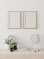 The living room is decorated with furniture, small plant pots photo