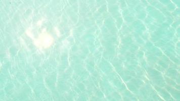 Abstract pool water crystal clear with sunlight reflect video
