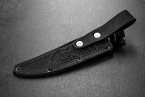 Beautiful leather case for a sharp hunting knife photo