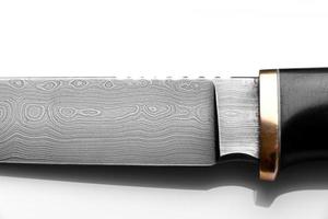 Handmade beautiful hunting knife with a sharp gray blade photo