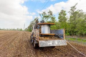 Coil with high-voltage cable mounted on wheeled truck photo