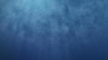 mar azul profundo con rayo de luz solar brillante y burbuja de aire