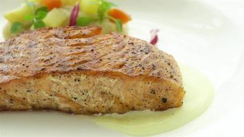 Grilled salmon meat steak with vegetable video