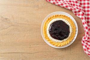 Blueberry Cheese Pie on white plate photo