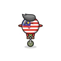 The cute malaysia flag badge character is riding a circus bike vector