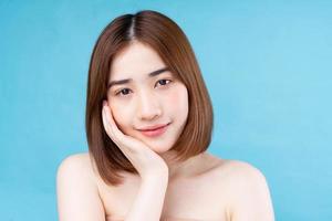 Attractive young Asian woman with youthful skin. photo