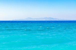 kremasti beach rodas grecia agua turquesa y vista de turquía.