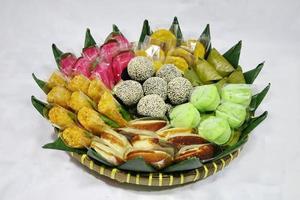 various kinds traditional Indonesian market snacks, on top of bamboo photo