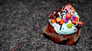 Close up view of various sweet cupcakes, bakery cake photo