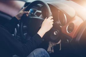 Woman driving a car photo