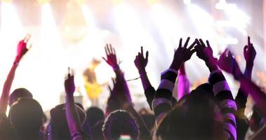 Silhouette of a concert crowd photo