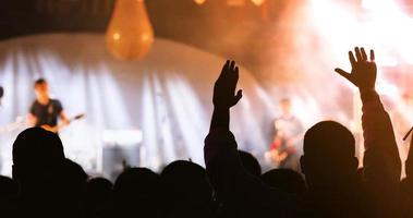 Silhouette of a concert crowd photo