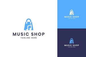 diseño de logotipo de espacio negativo de compras de música vector