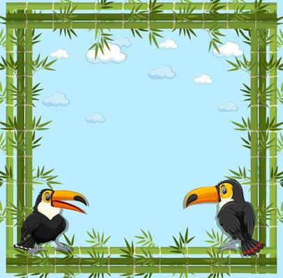 Empty banner with bamboo frame and toucan cartoon character