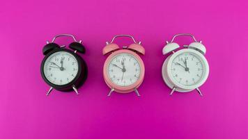 Face of Beautiful three alarm clock photo