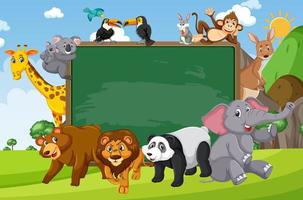 Empty blackboard with various wild animals in the forest vector