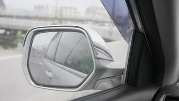street view from side mirror of car