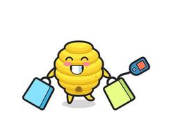 dibujos animados de la mascota de la colmena de abejas sosteniendo una bolsa de compras vector