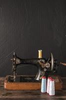 Cotton threads at the sewing machine photo