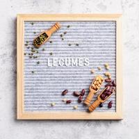 legumes with felt letter board with the text Legumes top view flat lay photo