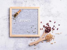 legumes with felt letter board with the text Legumes top view flat lay photo