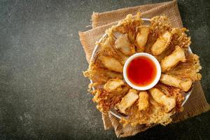 deep fried Enoki mushroom and King Oyster mushroom with spicy dipping sauce photo