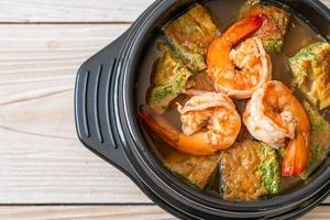 Sour soup made of Tamarind Paste with Shrimps and Vegetable Omelet photo