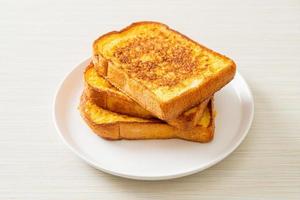 french toast on white plate photo