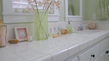 Interior of beach home bathroom sink with coastal decor